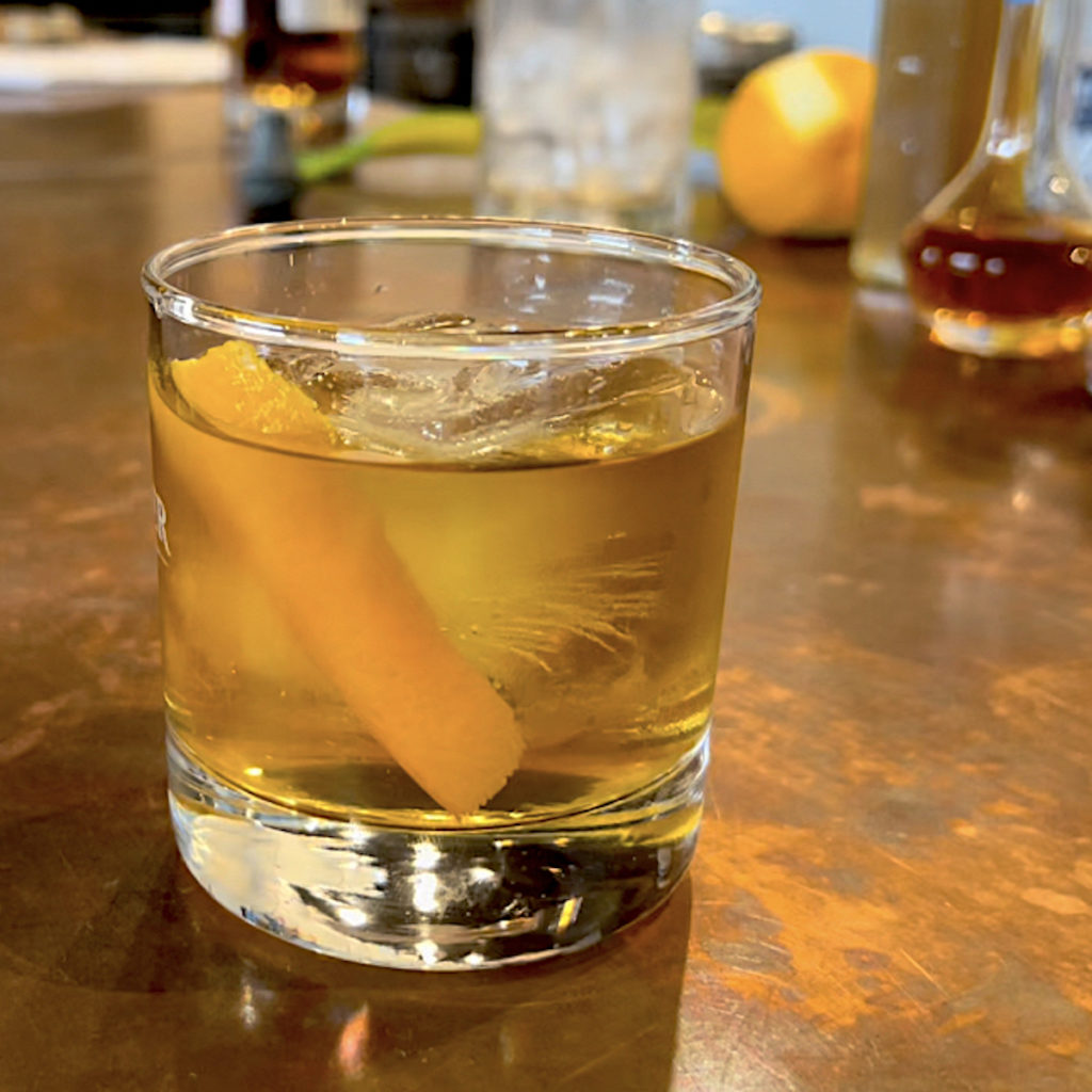 Bourbon Old Fashioned in a glass on a counter