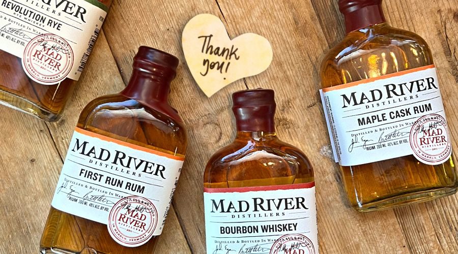 Mad River flask bottles on a table with a heart that says Thank You