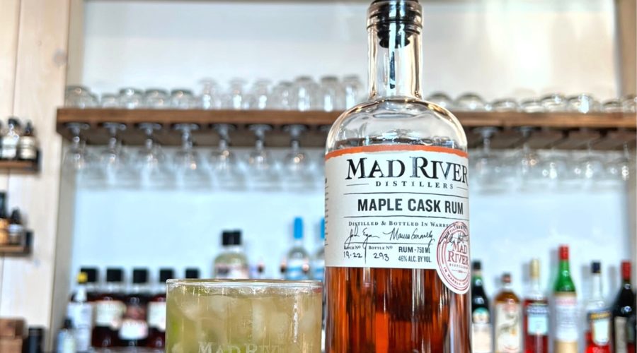 Winter Caipirinha cocktail and a bottle of Maple Cask Rum